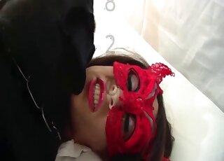 Close-up on lady's wet pussy while it's banged by horny dog cock