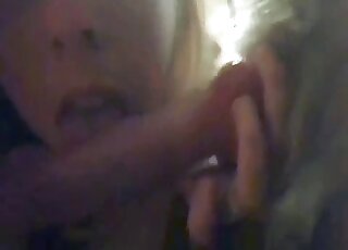 Blonde plays sloppy when putting the dog's dick deep in her mouth