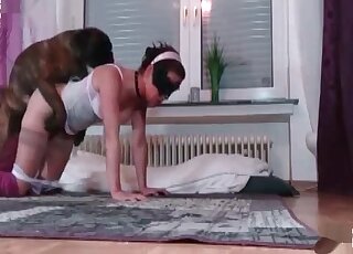 Chick in a mask takes off panties to enjoy animal sex with her dog